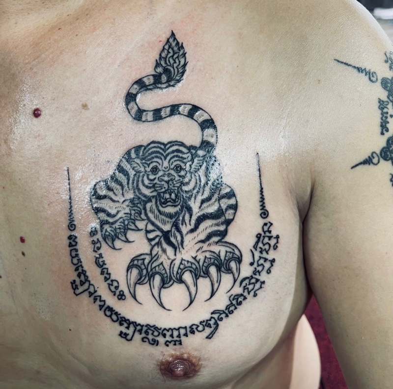 Tiger and Naga on chest
